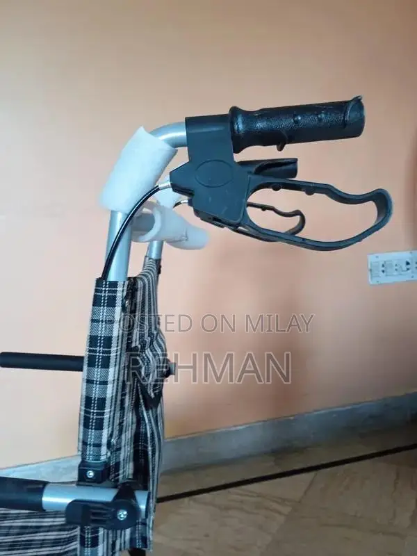 Compact Foldable Wheelchair - Like New Condition