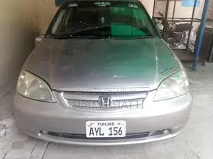 Photo - 2003 Honda Civic - Reliable Sedan with Low Mileage