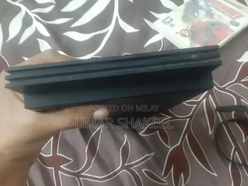 PlayStation 2 Console with Game, Controller, and Accessories