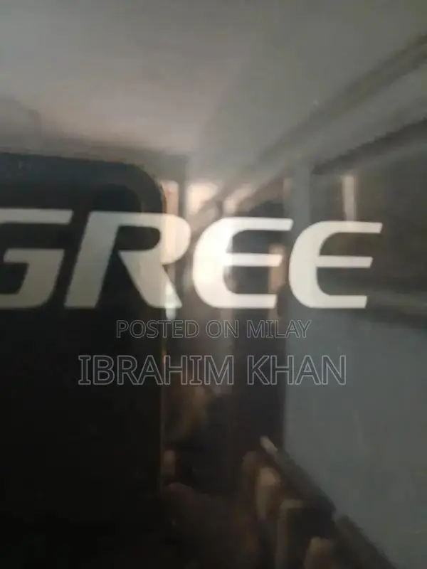 Gree Full Size Black Refrigerator - Spacious Home Appliance