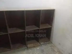 Photo - L-Shaped Counter with Storage Rack Set