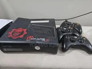 Photo - Xbox 360 Slim Gaming Console with Wireless Controllers and Games