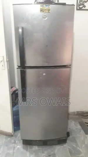 Photo - Used Refrigerator Requiring Repair - As-Is Condition