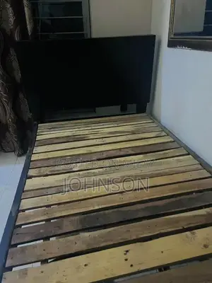 Photo - Single Bed Frame - Comfortable and Practical Sleeping Solution