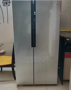 Photo - Haier Side-by-Side Refrigerator - Spacious Kitchen Cooling Solution