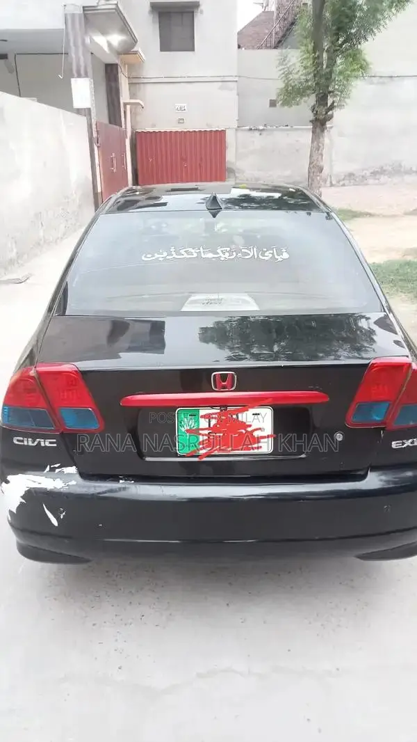 2005 Honda Civic EXi Sedan - Well Maintained Reliable Vehicle