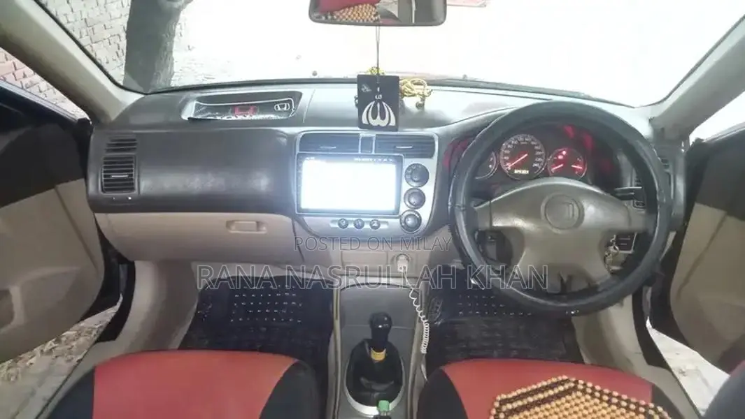 2005 Honda Civic EXi Sedan - Well Maintained Reliable Vehicle