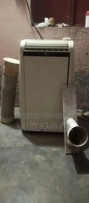 Photo - Portable Air Conditioner with Humidifier and Cooling Functions