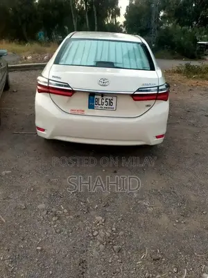 Photo - Toyota Corolla GLI Sedan Compact Car