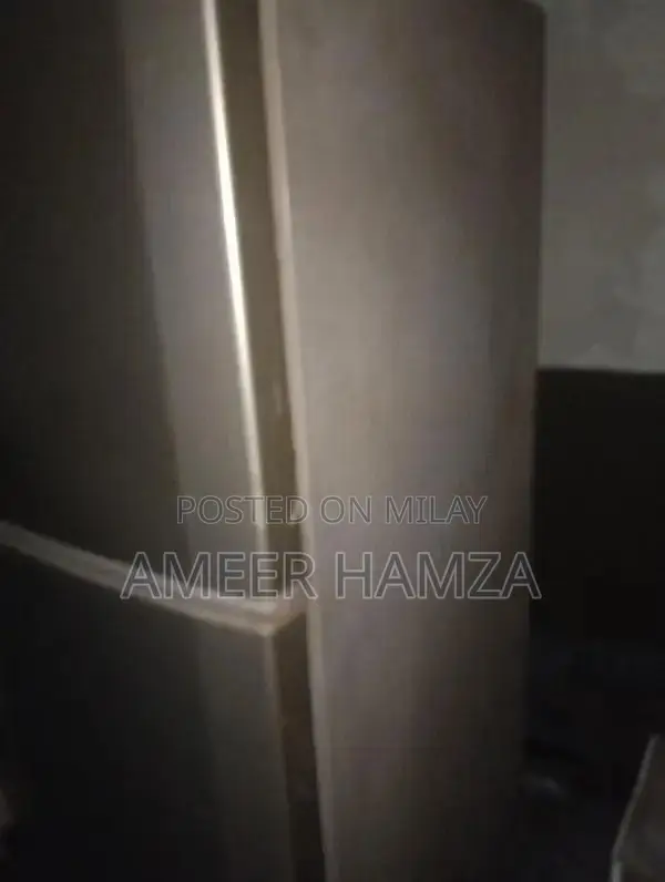 Used Medium-Size Refrigerator in Good Condition