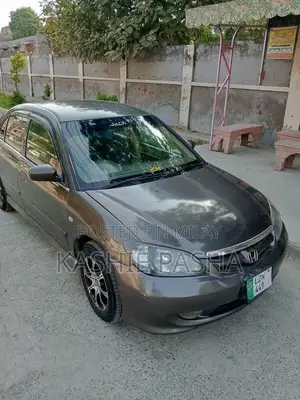 Photo - 2005 Honda Civic Automatic Sedan - Well-Maintained City Car