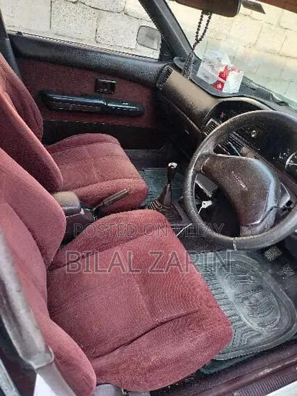 Toyota Corolla Sedan - Reliable City Car