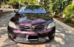 Photo - Toyota Corolla GLI 1.6 Automatic Sedan 2013 Model