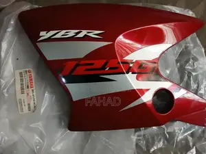 Photo - Yamaha YBR 125G Genuine Spare Parts - Red Side Covers