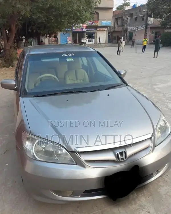 Honda Civic 2004 EXi Sedan - Well-Maintained Family Car
