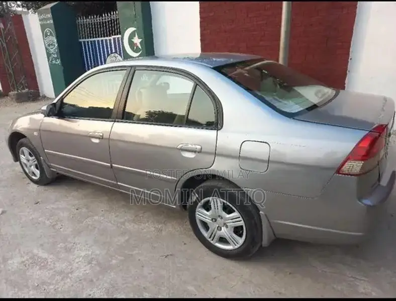 Honda Civic 2004 EXi Sedan - Well-Maintained Family Car