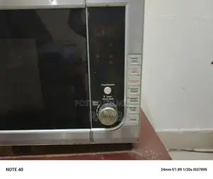 Black and Grey Microwave Appliance - Compact Kitchen Model DW-381