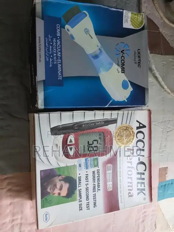 V-Comb Anti-Lice Vacuum Machine and Accu-Check Glucose Meter