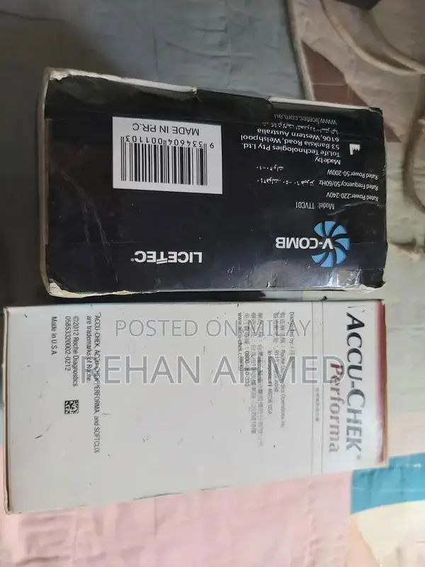 V-Comb Anti-Lice Vacuum Machine and Accu-Check Glucose Meter