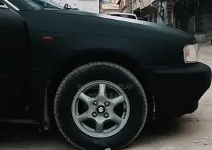 1999 Suzuki Baleno - Reliable Family Sedan with Custom Modifications