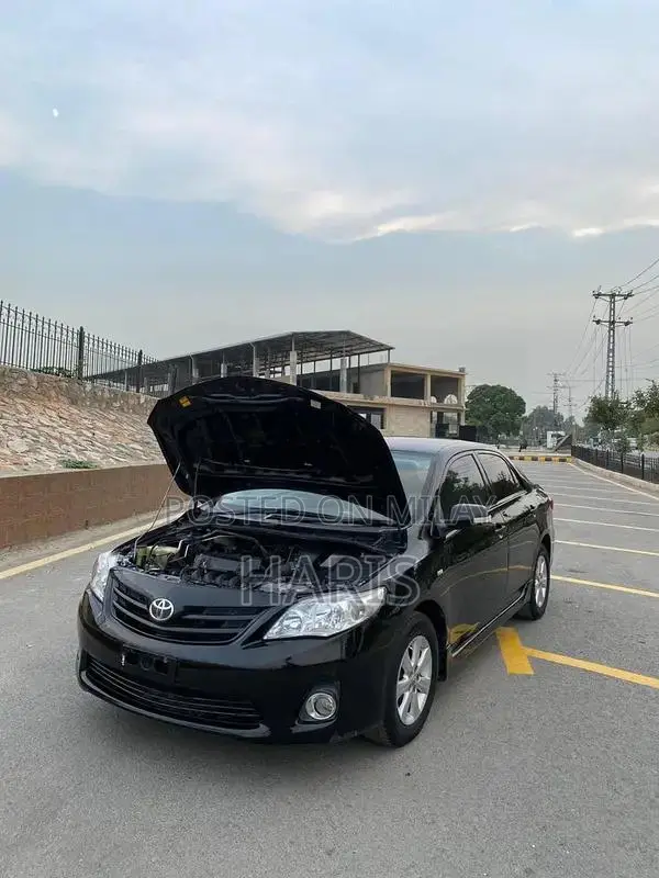 2012 Toyota XLI Sedan - Gli Converted with Altis Rims