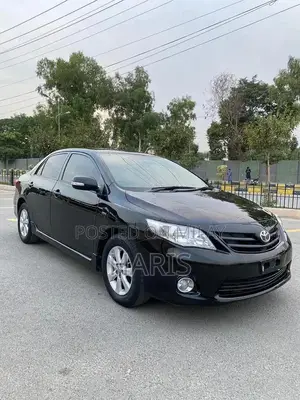 2012 Toyota XLI Sedan - Gli Converted with Altis Rims
