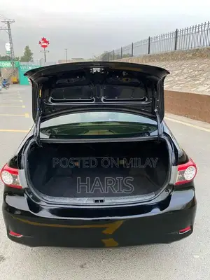 2012 Toyota XLI Sedan - Gli Converted with Altis Rims