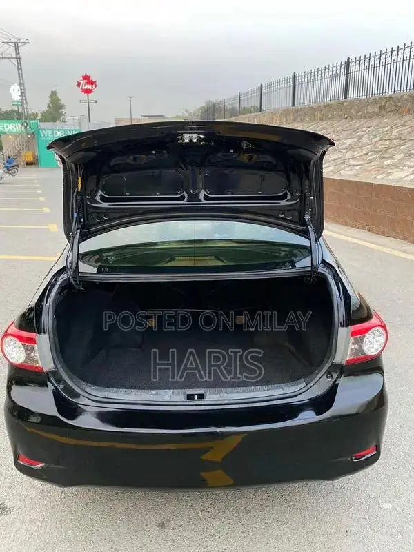 2012 Toyota XLI Sedan - Gli Converted with Altis Rims