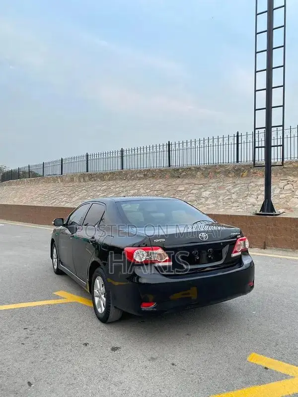 2012 Toyota XLI Sedan - Gli Converted with Altis Rims