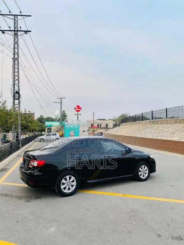 2012 Toyota XLI Sedan - Gli Converted with Altis Rims