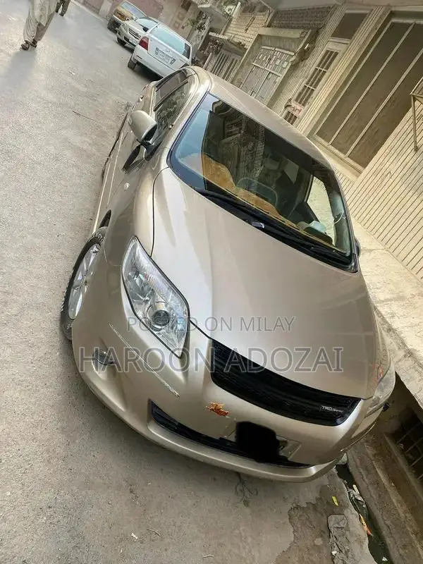 Axio G Grade Sedan - 2007 Model Golden Automatic Sedan