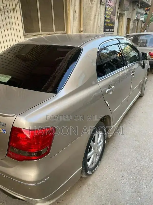 Axio G Grade Sedan - 2007 Model Golden Automatic Sedan