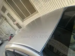 Axio G Grade Sedan - 2007 Model Golden Automatic Sedan