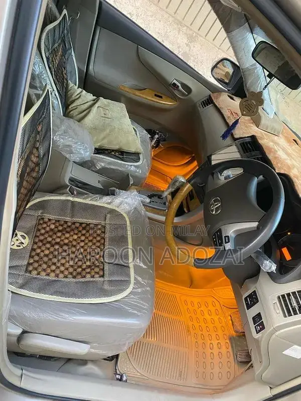 Axio G Grade Sedan - 2007 Model Golden Automatic Sedan