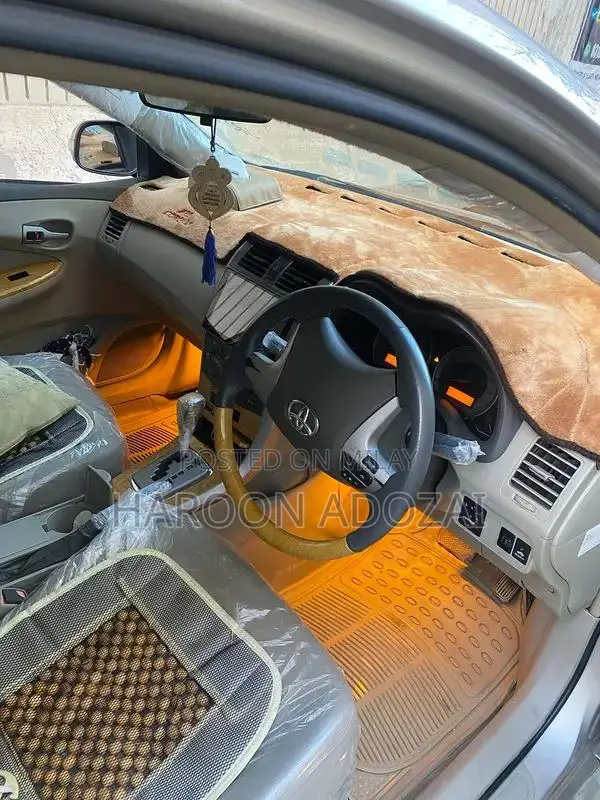 Axio G Grade Sedan - 2007 Model Golden Automatic Sedan