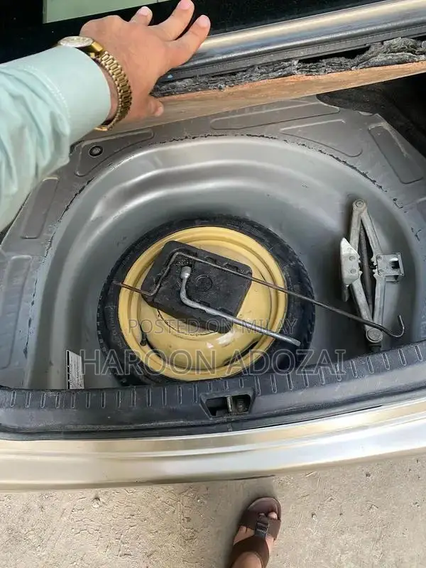 Axio G Grade Sedan - 2007 Model Golden Automatic Sedan