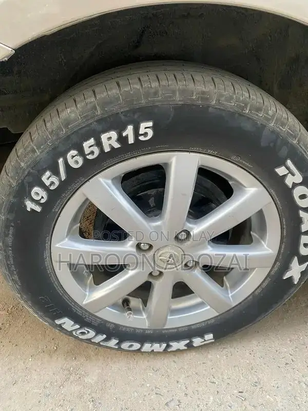 Axio G Grade Sedan - 2007 Model Golden Automatic Sedan