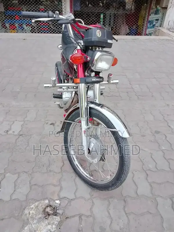 Honda 125 Motorcycle - Red Model 22