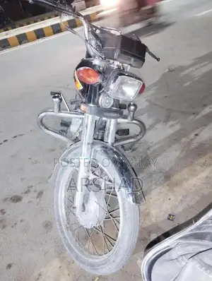 Photo - Honda 125 Motorcycle - Good Condition, Well-Maintained