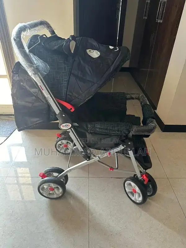 Baby Stroller with Adjustable Shade and Accessory Pouch