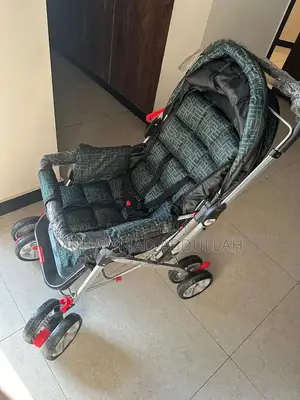Baby Stroller with Adjustable Shade and Accessory Pouch