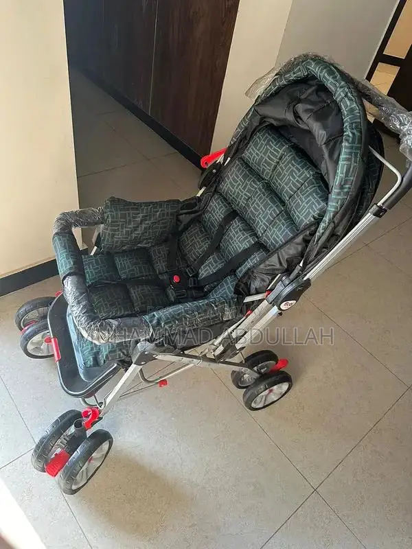 Baby Stroller with Adjustable Shade and Accessory Pouch