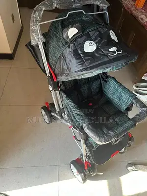 Baby Stroller with Adjustable Shade and Accessory Pouch