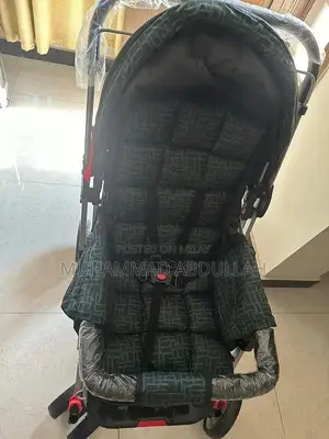 Baby Stroller with Adjustable Shade and Accessory Pouch
