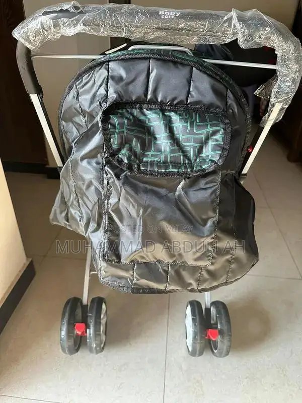 Baby Stroller with Adjustable Shade and Accessory Pouch