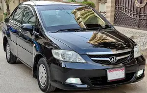 Photo - Honda City IDS-I 1.3CC Sedan - Metallic Black Manual Transmission