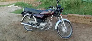 Photo - Honda 70cc Motorcycle - 2025 Model