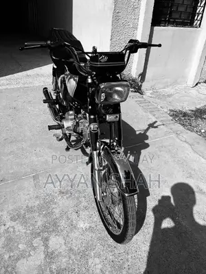 United 70cc Motorcycle: Low Mileage, Well-Maintained Bike