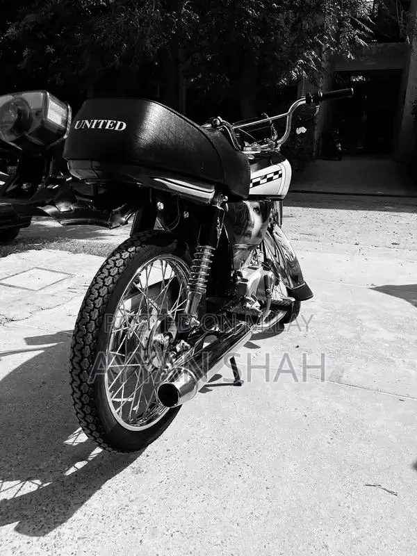 United 70cc Motorcycle: Low Mileage, Well-Maintained Bike