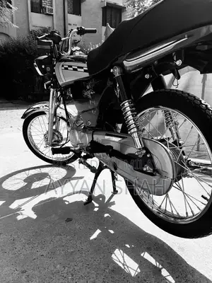 United 70cc Motorcycle: Low Mileage, Well-Maintained Bike